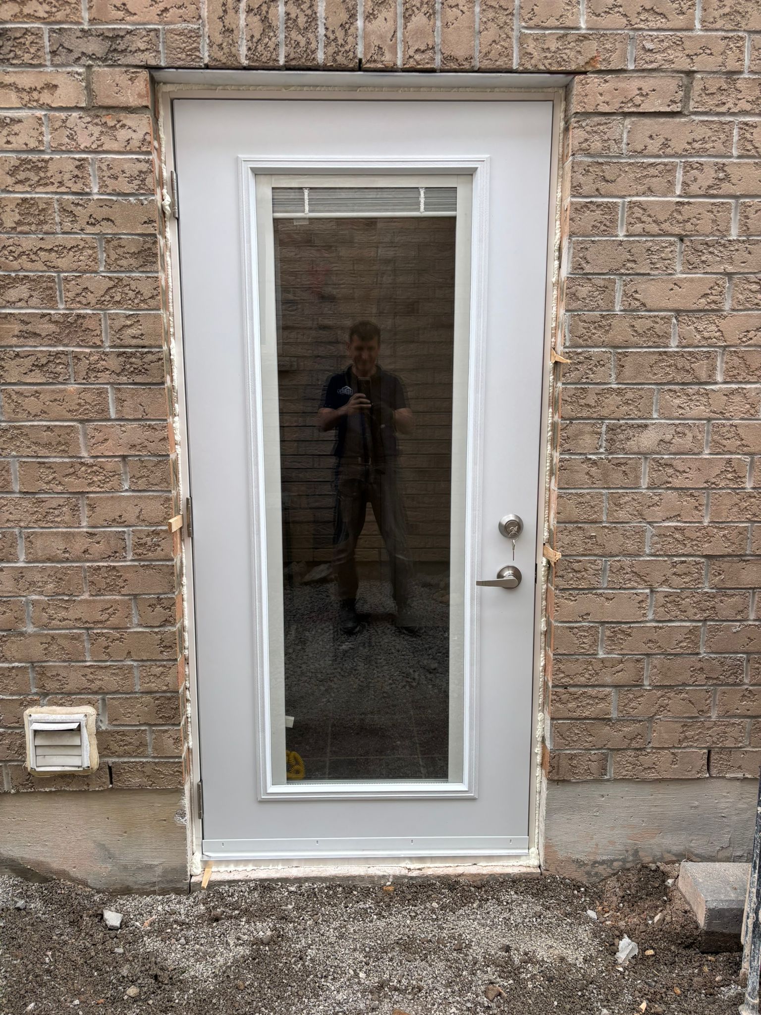 Full-glass entry door installation