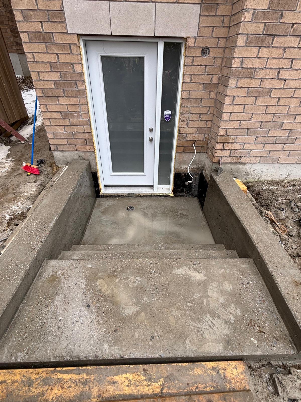 Walk-out basement entrance with new door installation